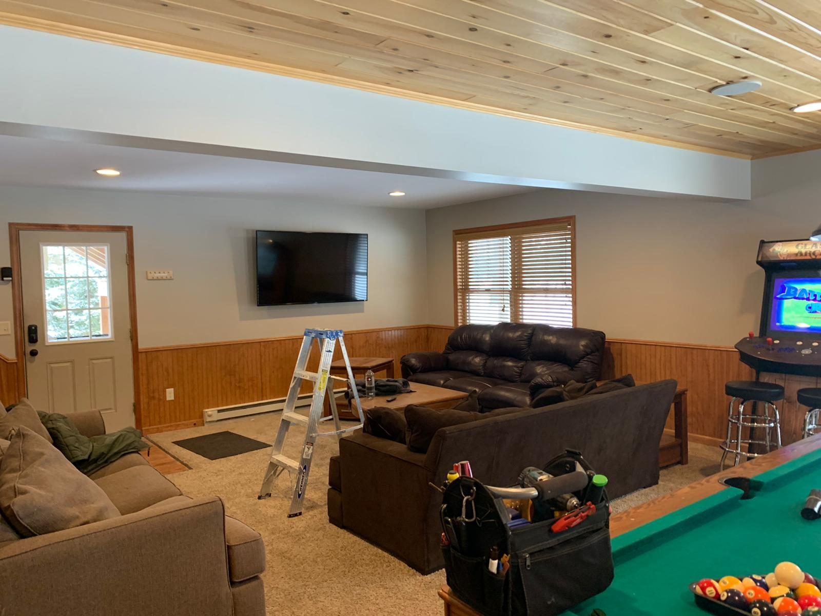 Basement/living space repaint — bright, clean result