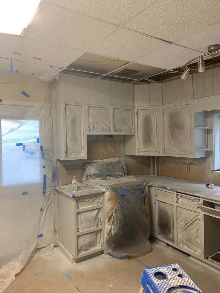 Kitchen cabinet prep — masked & protected